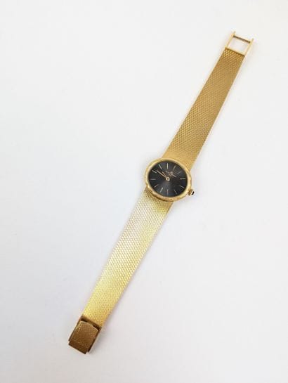 BAUME & MERCIER
Montre bracelet dame en or...