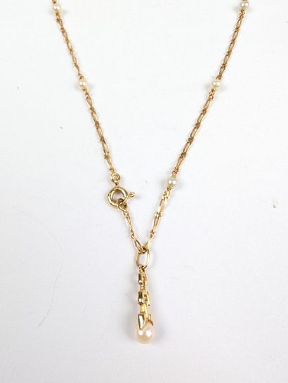 Collier en or jaune 750 ‰ comprenant une...