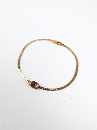 Bracelet en or jaune 750 ‰ serti de petits...