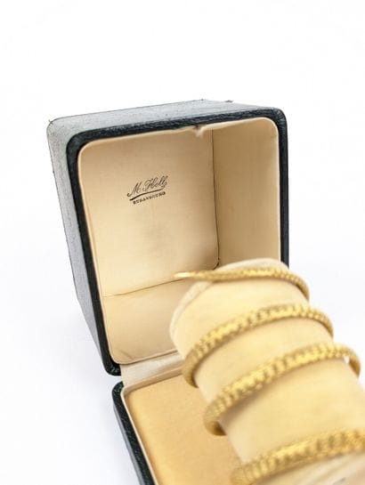 Important bracelet en or jaune 750 ‰ figurant...