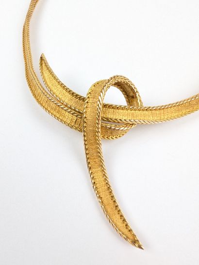 Collier en or jaune 750 ‰ maille semi-rigide...