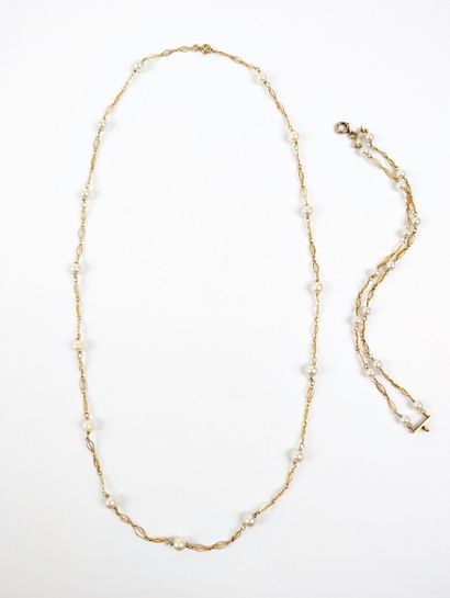 Parure en or jaune 750 ‰ comprenant un collier...