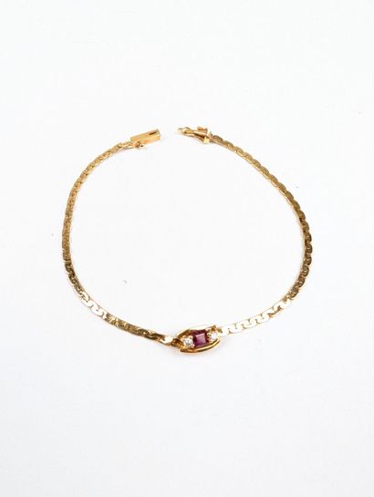 Bracelet en or jaune 750 ‰ serti de petits...