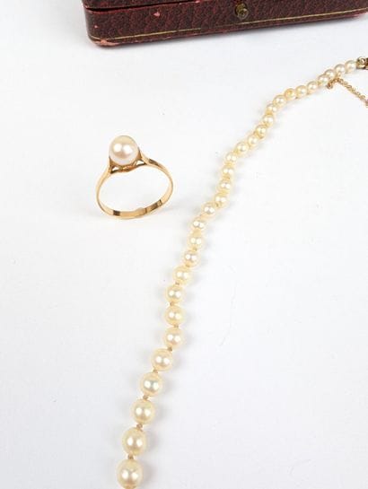 Parure en or rose 750 ‰ et perles de culture...