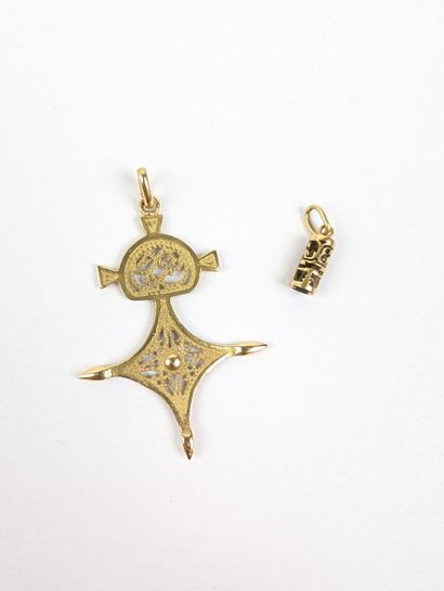 Deux pendentifs en or jaune 750 ‰, l'un figurant...