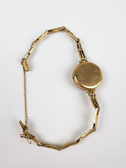JUVENIA
Montre bracelet dame en or jaune...