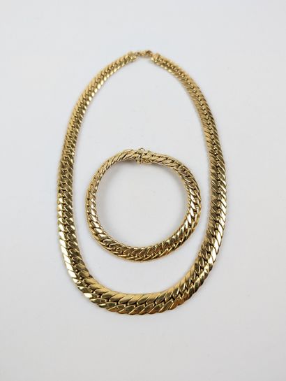Parure en or jaune 750 ‰ maille anglaise...