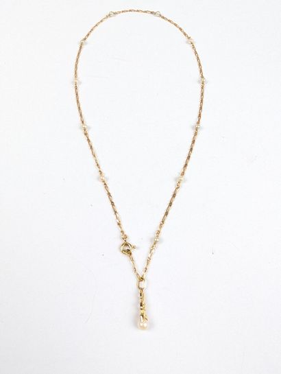Collier en or jaune 750 ‰ comprenant une...