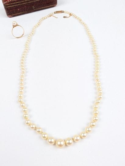 Parure en or rose 750 ‰ et perles de culture...