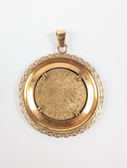 Médaille en or jaune 750 ‰ ornée d'une pièce...