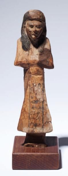 Oushebti En bois, vêtu du costume des vivants....