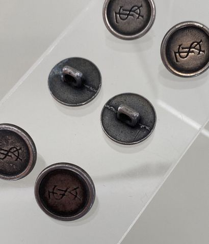 YVES SAINT LAURENT Set of 8 silver patinated...