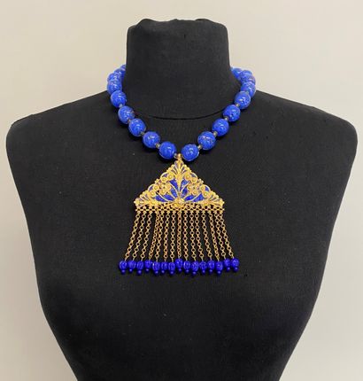 Attributed to YVES SAINT LAURENT by GRIPOIX...