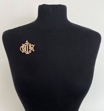 CHRISTIAN DIOR Brooch with brand name in...
