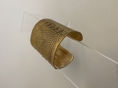 CHANEL Ethnic cuff in gilded metal - signed...