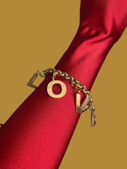 YVES SAINT LAURENT LOVE bracelet with gilded...