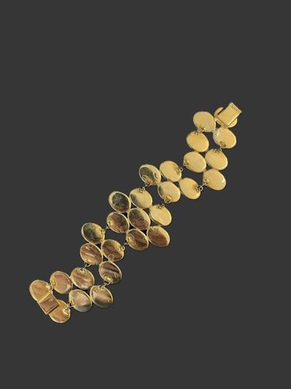 YVES SAINT LAURENT Haute couture Gilt metal...