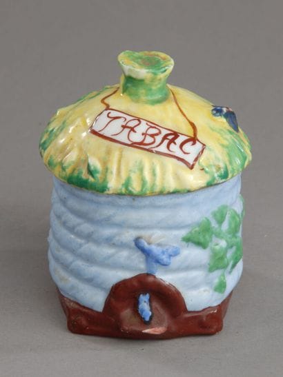 Small, sky-blue, cylindrical tobacco jar...