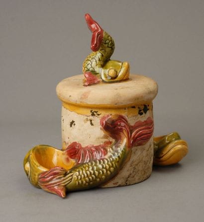 Large, round tobacco jar made of unglazed...