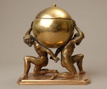 A spectacular copper tobacco jar depicting...