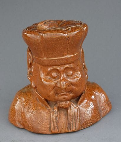Large tobacco jar depicting, in bust form,...