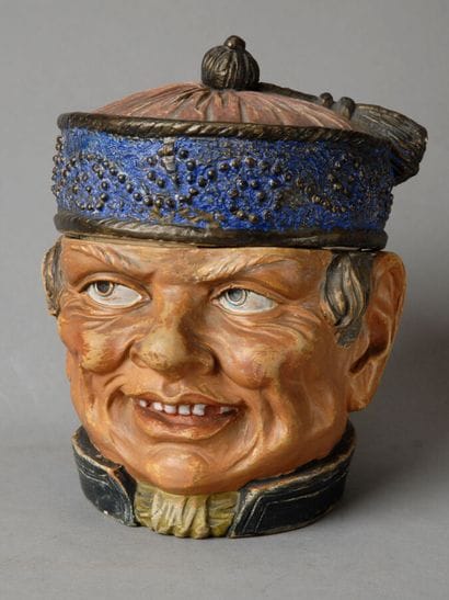 Large tobacco jar depicting the head of a...