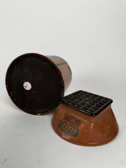 Cylindrical tobacco jar depicting a heating...