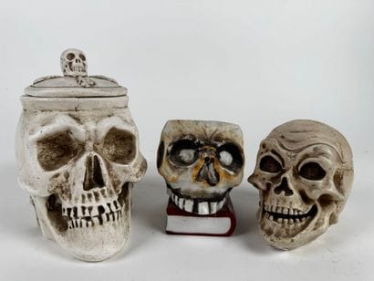 A large tobacco jar made of glossy white...
