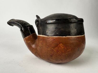 Pipe-shaped tobacco jar. Glazed terracotta....