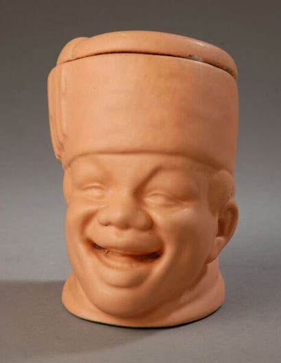 Tobacco jar depicting the character from...