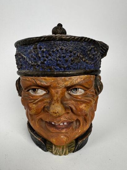 Large tobacco jar depicting the head of a...