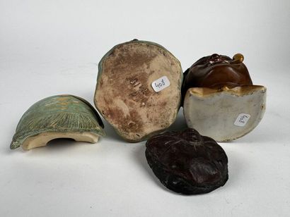 Three tobacco jars.

