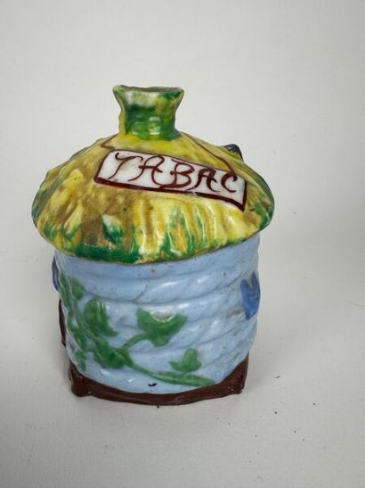 Small, sky-blue, cylindrical tobacco jar...