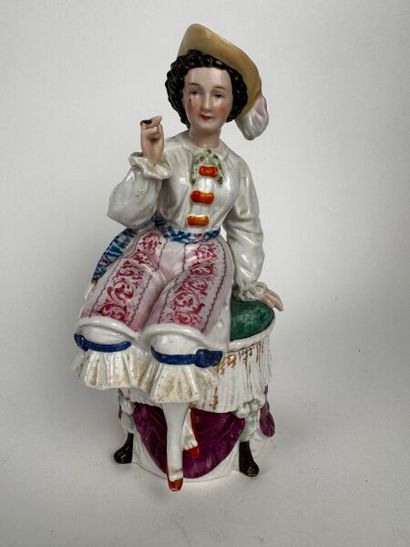 Tobacco jar. A figure of a woman of easy...