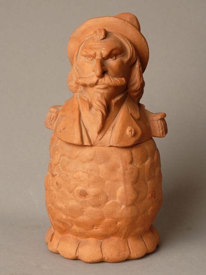 Tobacco jar. A whimsical composite depicting...