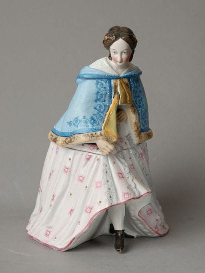 A tobacco jar depicting an elegant Second...