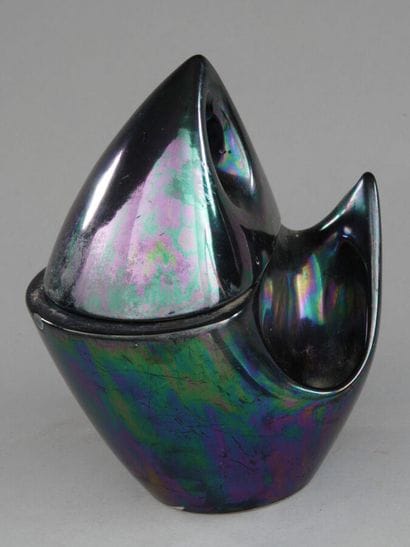 A metallic midnight blue urn, roughly triangular...