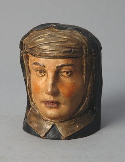 Tobacco jar. An Arab head, mouth slightly...