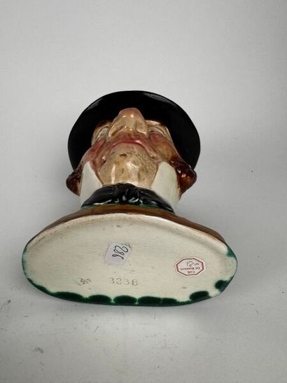 Tobacco jar. The figure is that of a bourgeois...