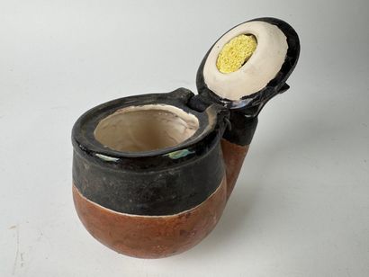 Pipe-shaped tobacco jar. Glazed terracotta....