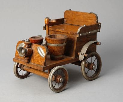 Large tobacco jar shaped like a wagon, without...