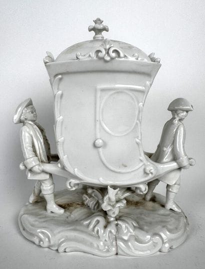 White porcelain tobacco jar shaped like a...