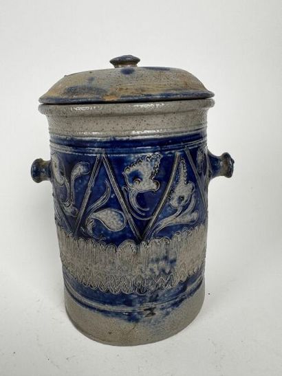 Tall, urn-shaped tobacco jar made of gray...