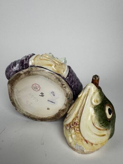 A whimsical tobacco jar depicting the head...