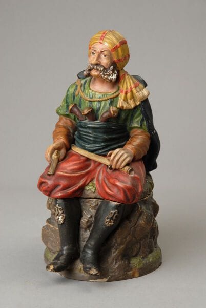 A large tobacco jar, ending at the knees,...