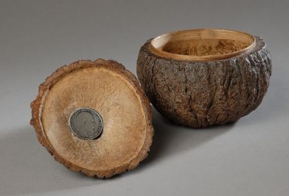 An intriguing tobacco jar carved from a coconut....