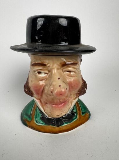 Tobacco jar. The figure is that of a bourgeois...