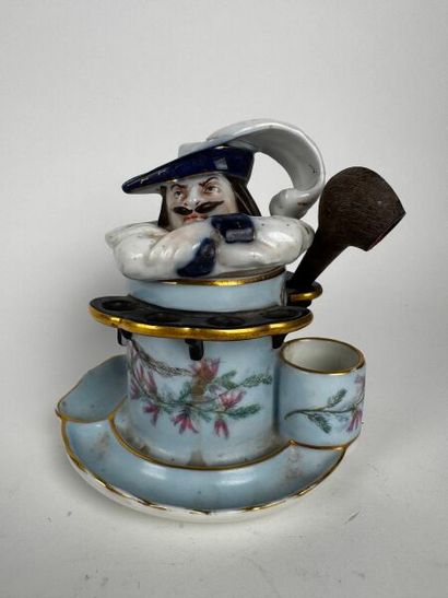 A tobacco jar whose body—made of sky-blue...