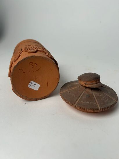 Glazed earthenware, brass lid. 
Included...