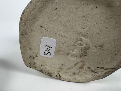 Set of seven bisque-fired terracotta pots...
